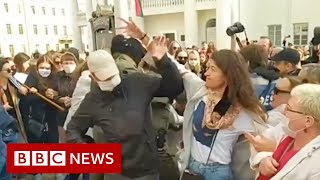 Belarus protests Women try to unmask those detaining protesters  BBC News [upl. by Borreri]