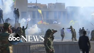 Shiite militia crowds storm US Embassy walls in Baghdad [upl. by Siri]