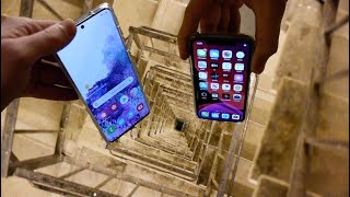 Dropping Samsung Galaxy S20 vs iPhone 11 Pro Down Spiral Staircase  200 Feet  Will It Survive [upl. by Joktan]