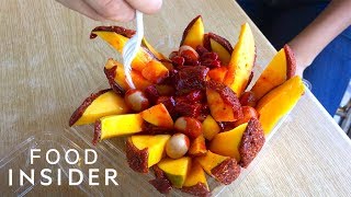 Whole Mangos Are Covered In Chamoy Paste [upl. by Ennayoj]