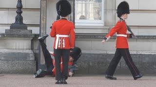 Buckingham Palace Guard Slips and Falls During Changing of the Guard [upl. by Oralla]